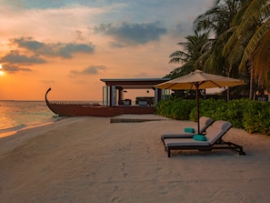 Private beach, white sand, sun loungers, beach umbrellas