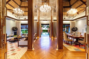 Signature Suite | Living area | 55-inch LCD TV with satellite channels, TV