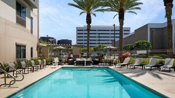 Outdoor pool, open 6:00 AM to 10:00 PM, sun loungers