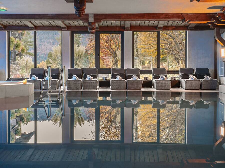 Indoor pool, outdoor pool, open 9:00 AM to 8:00 PM, pool umbrellas