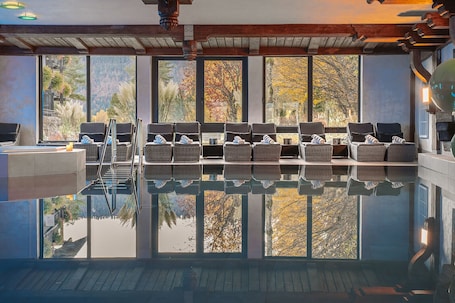 Indoor pool, outdoor pool, open 9:00 AM to 9:00 PM, pool umbrellas. Alpin & Wellness Resort Hotel Ludwig Royal