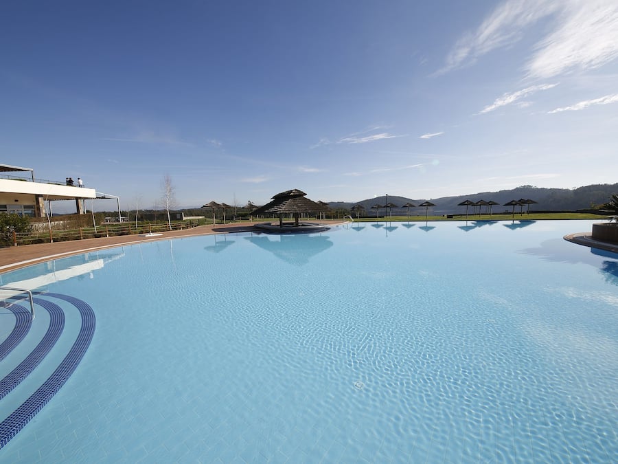 Indoor pool, seasonal outdoor pool, pool umbrellas, pool loungers