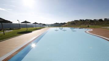 Indoor pool, seasonal outdoor pool, pool umbrellas, sun loungers