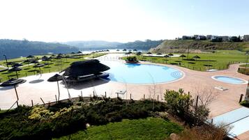 Indoor pool, seasonal outdoor pool, pool umbrellas, pool loungers