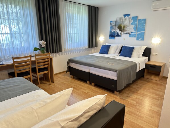 Standard Triple Room, Ensuite | Premium bedding, minibar, in-room safe, desk