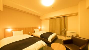 Down comforters, desk, blackout drapes, iron/ironing board