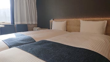 Premium bedding, down comforters, in-room safe, blackout drapes