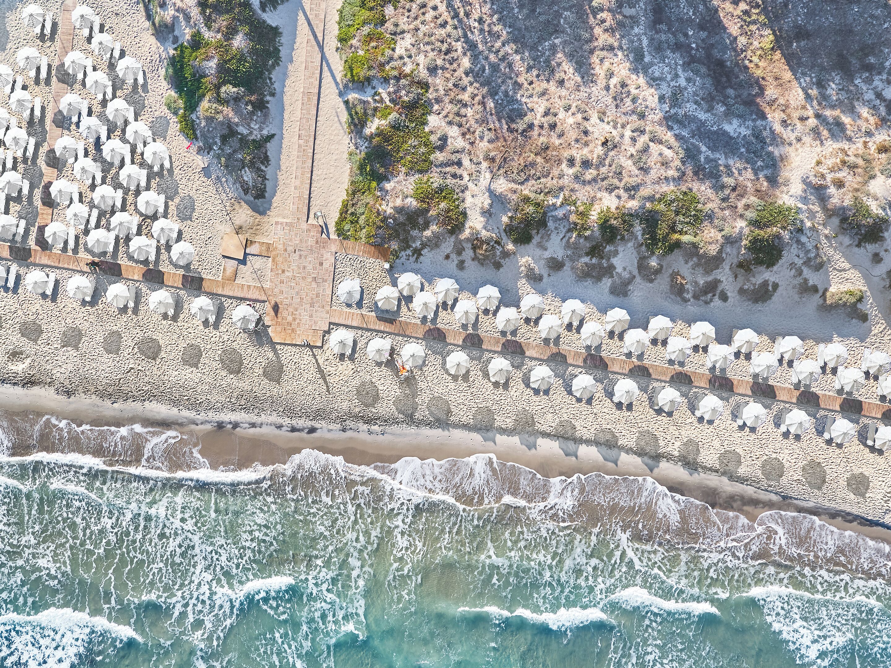 On the beach, sun loungers, beach umbrellas, beach towels