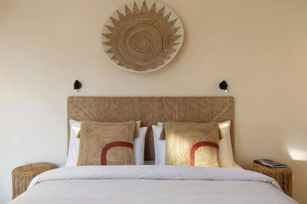 Down duvets, Select Comfort beds, in-room safe, desk