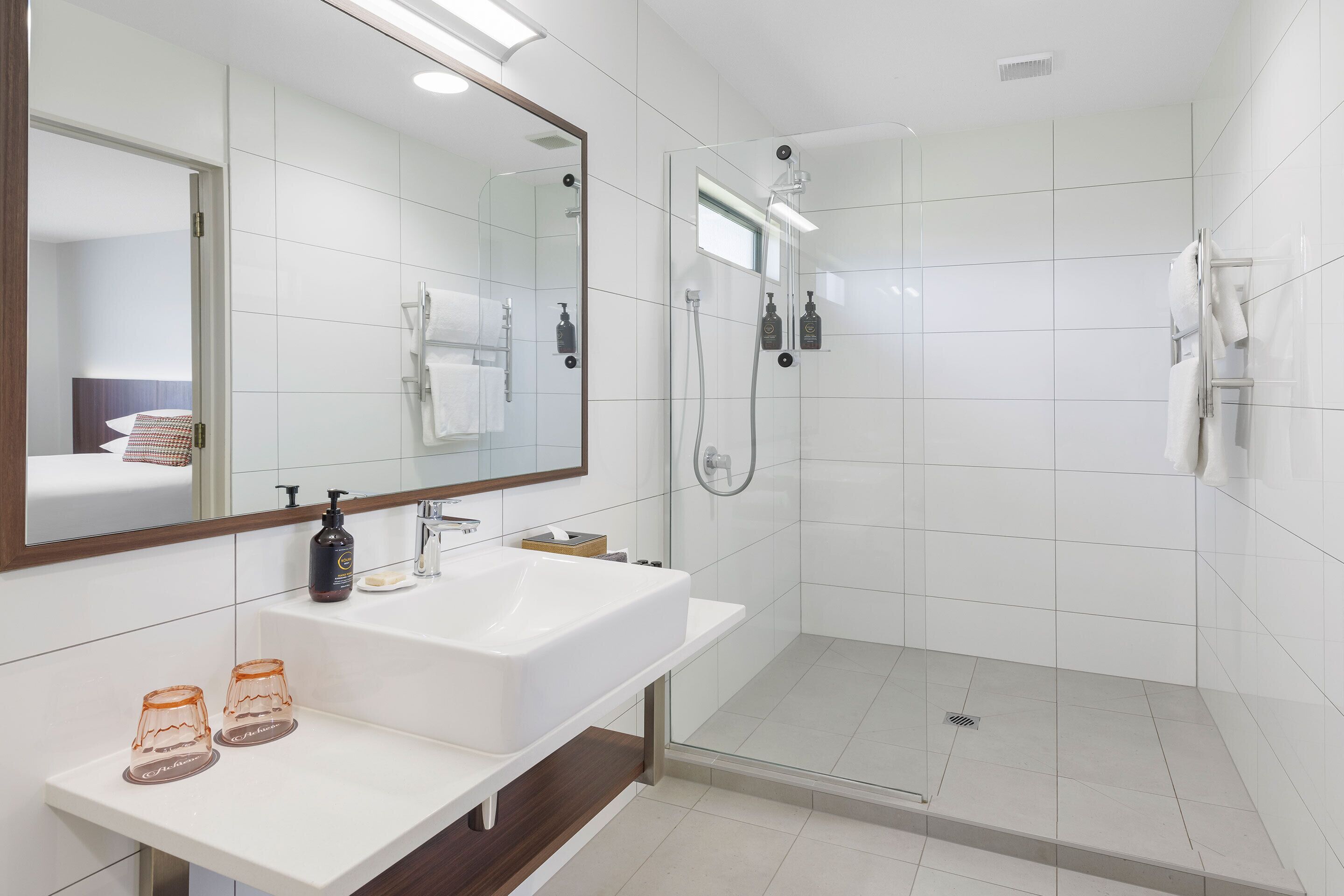 superior king | bathroom | shower, free toiletries, hair dryer, bathrobes