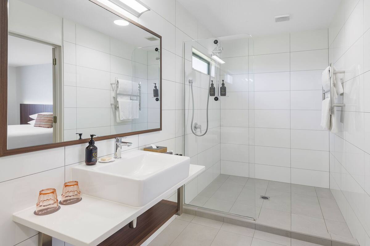 superior king | bathroom | shower, free toiletries, hair dryer, bathrobes