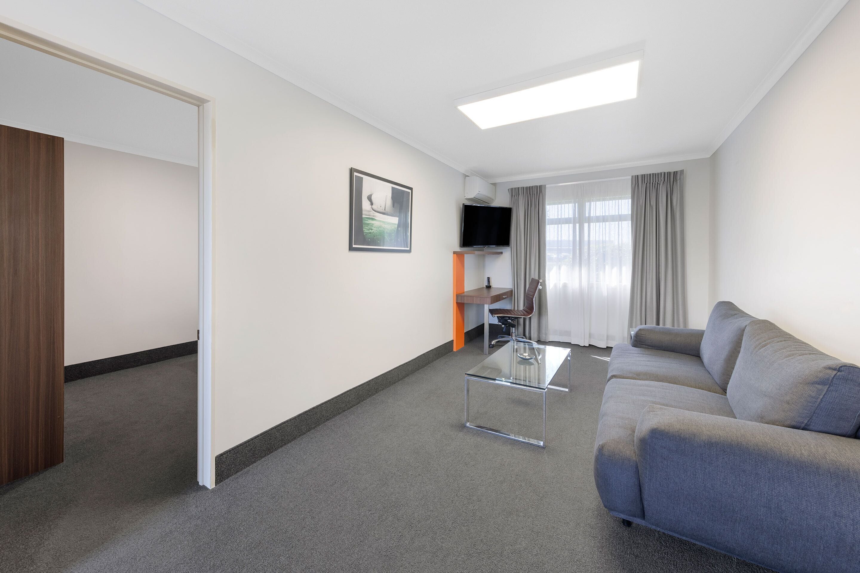 executive suite | living area | lcd tv