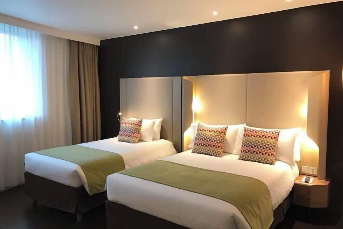Premium bedding, pillow-top beds, in-room safe, individually decorated