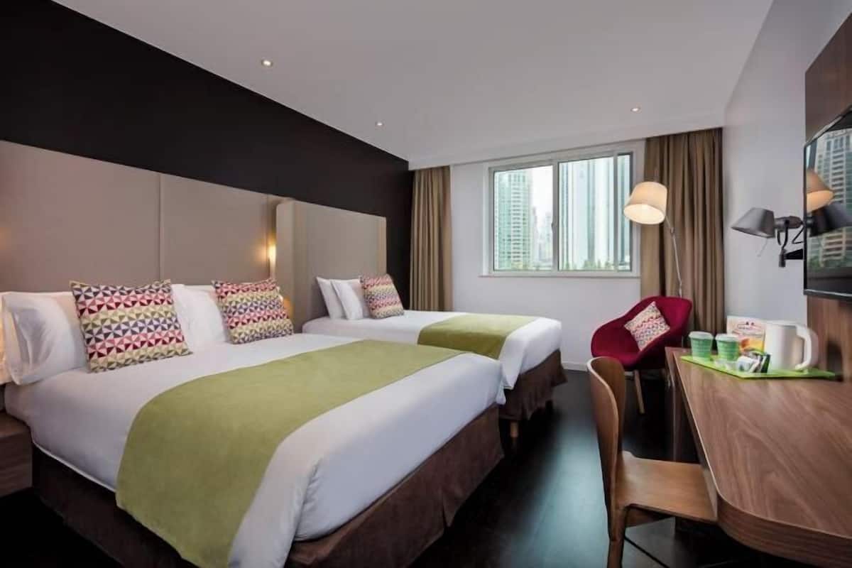 Premium bedding, pillow-top beds, in-room safe, individually decorated