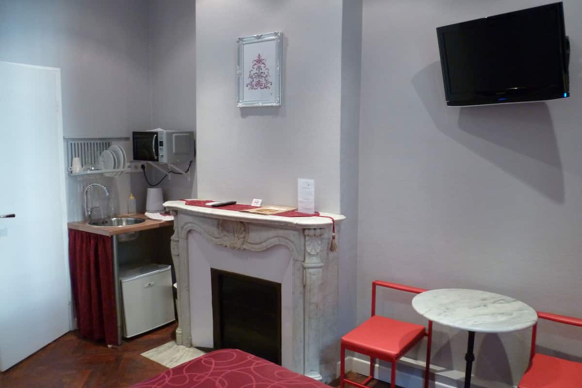 standard double room | living area | 32-inch plasma tv with satellite channels, tv