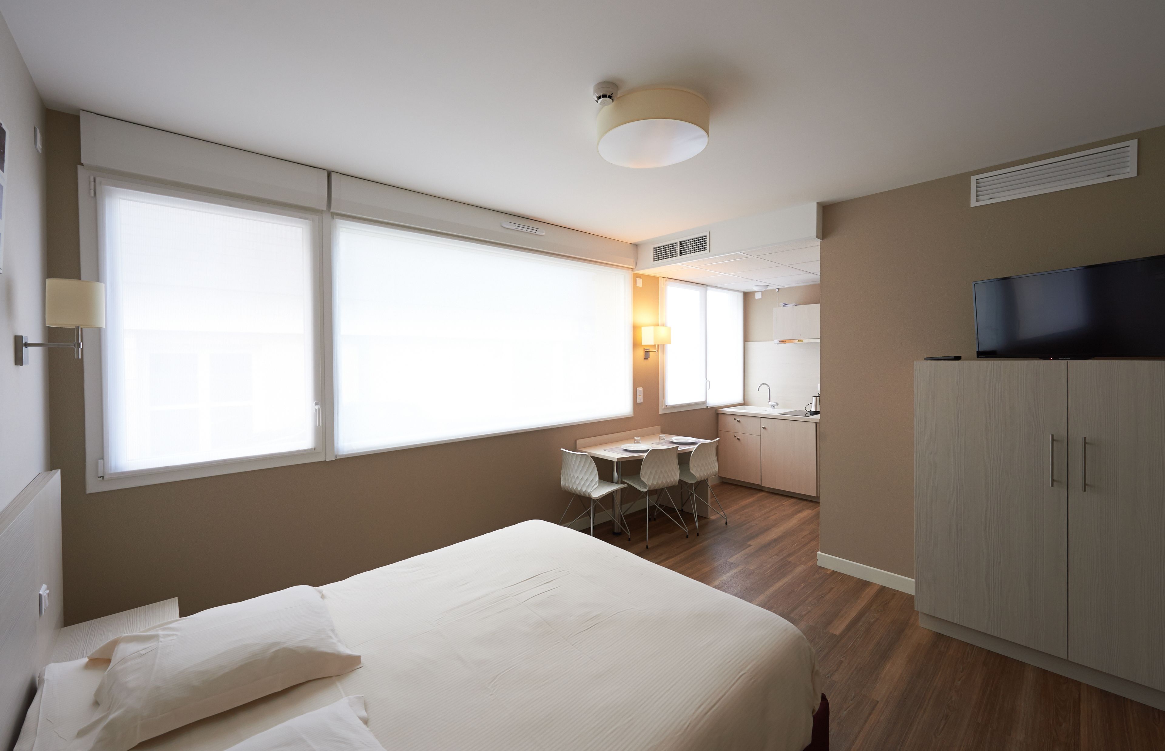 studio | premium bedding, select comfort beds, individually decorated