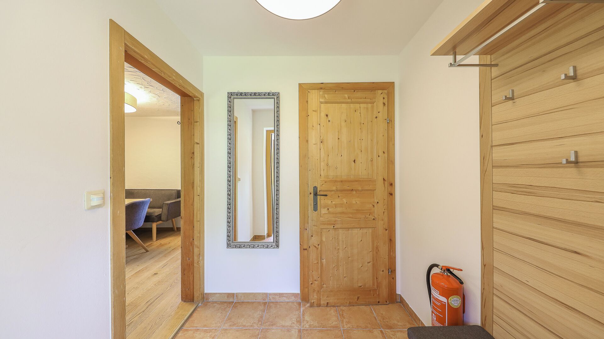 deluxe apartment, mountain view, garden area (or bungalow) | living area | 75-cm flat-screen tv with satellite channels, tv, ping pong