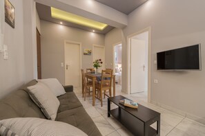 Family Apartment, 2 Bedrooms, Terrace, Courtyard View | Living area | Flat-screen TV - Katerina (Zakynthos)