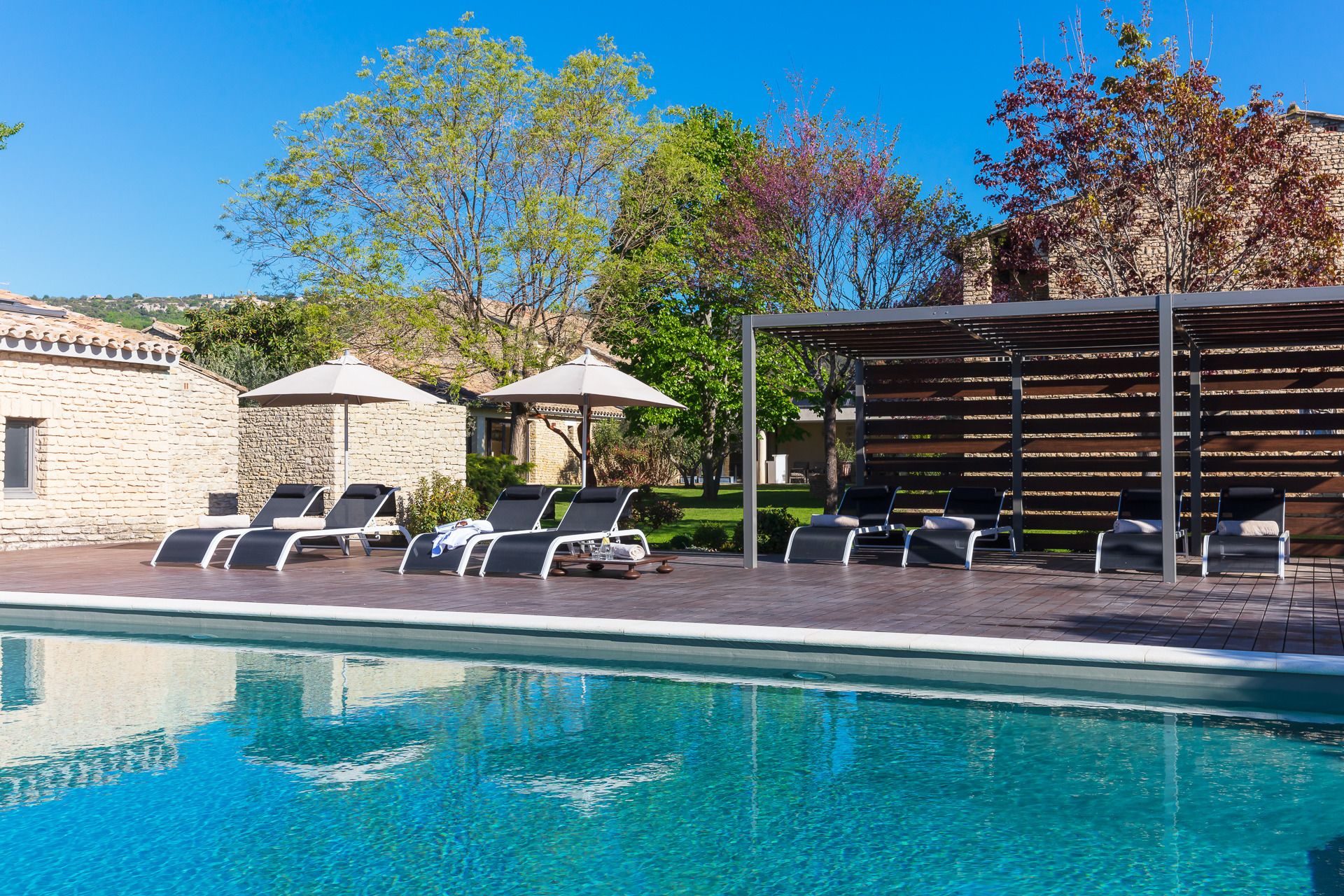 seasonal outdoor pool, open 8:00 am to 9:00 pm, pool umbrellas