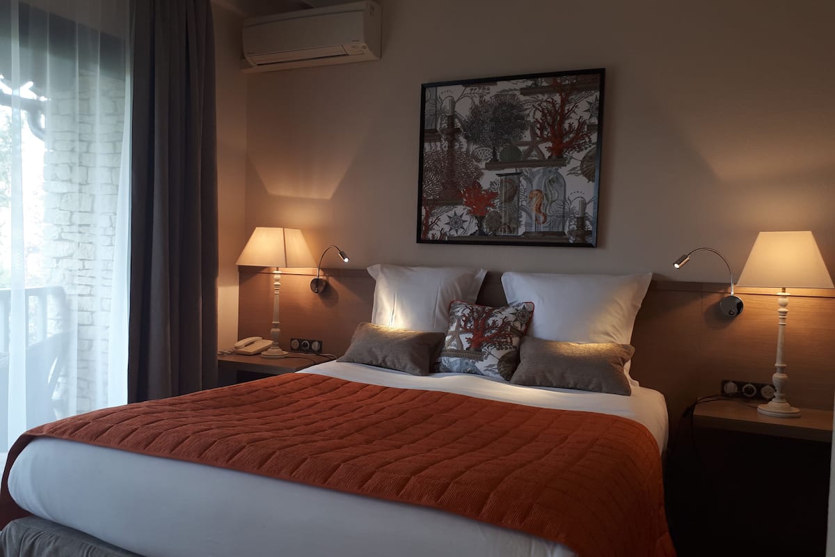 superior double room, garden view | premium bedding, minibar, in-room safe, individually decorated