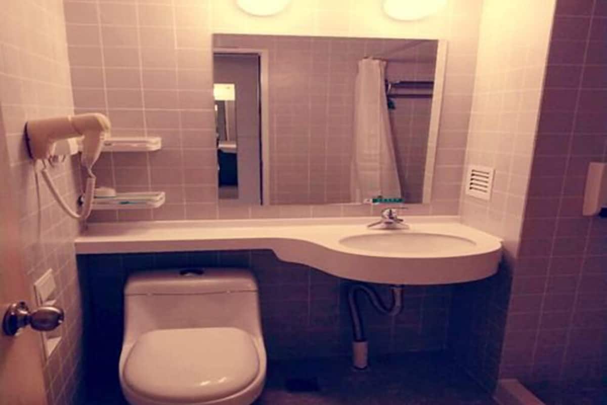 Shower, free toiletries, hair dryer, slippers