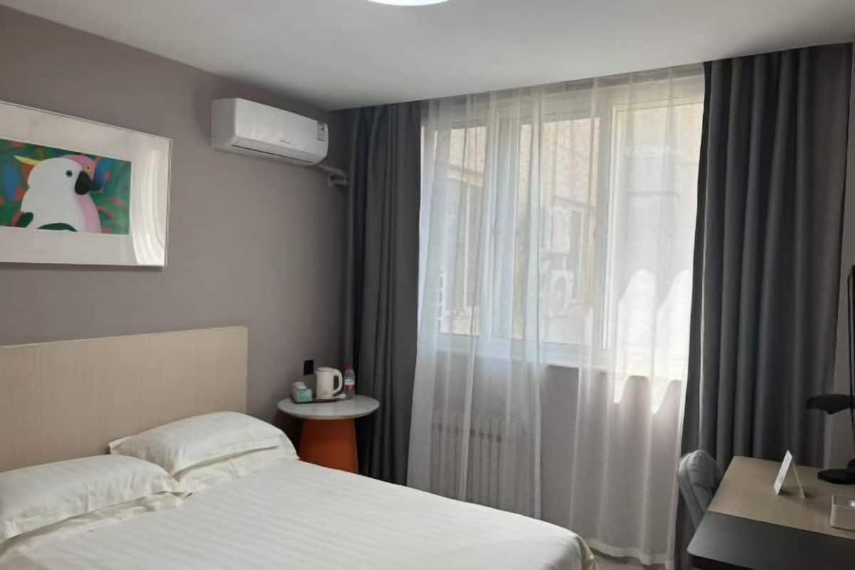 Desk, blackout drapes, iron/ironing board, free WiFi