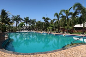 Outdoor pool, open 9:00 AM to 6:30 PM, pool umbrellas, pool loungers