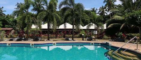 Outdoor pool, open 9:00 AM to 6:30 PM, pool umbrellas, pool loungers