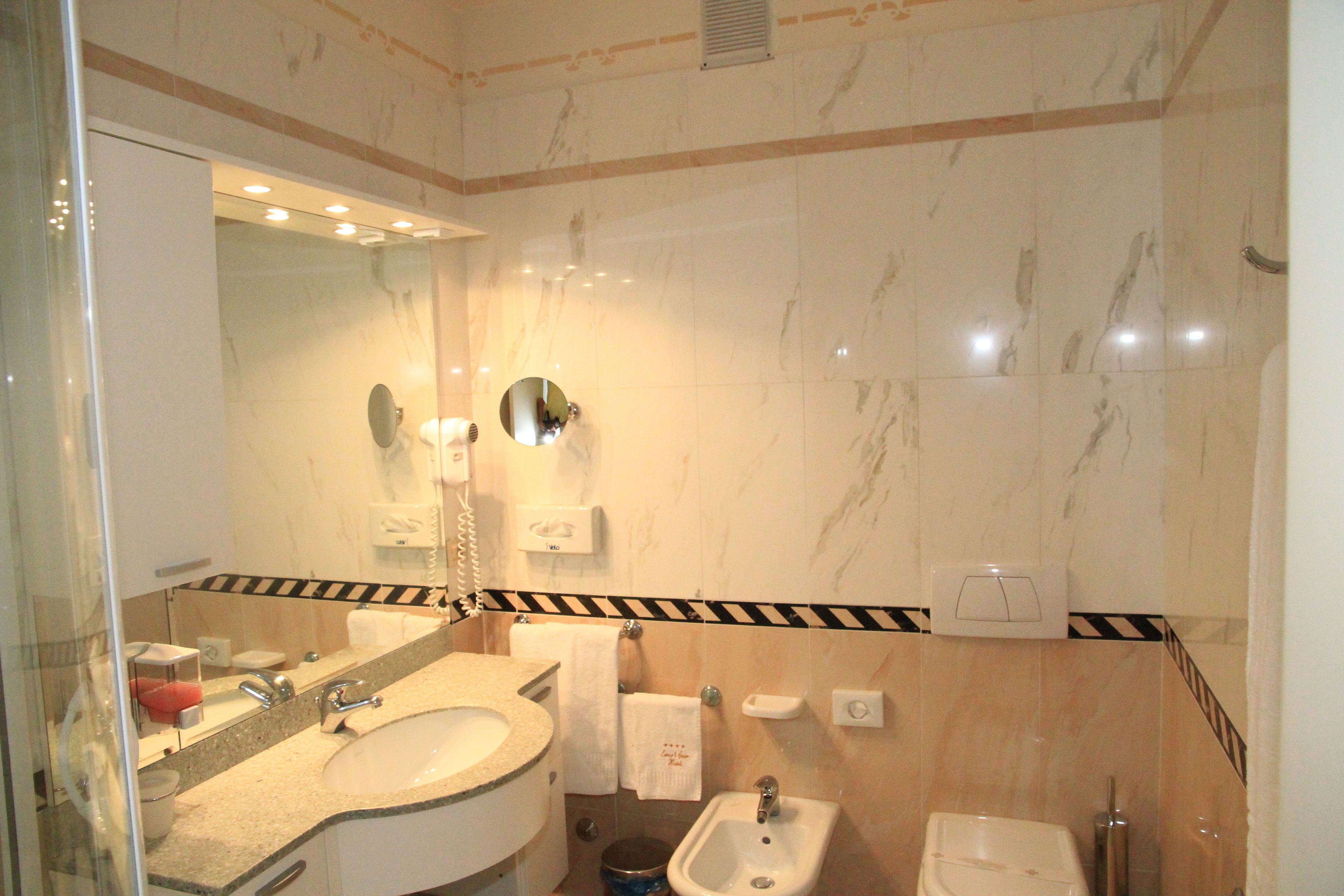 shower, free toiletries, hair dryer, bidet