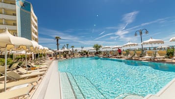 Outdoor pool, pool umbrellas, sun loungers