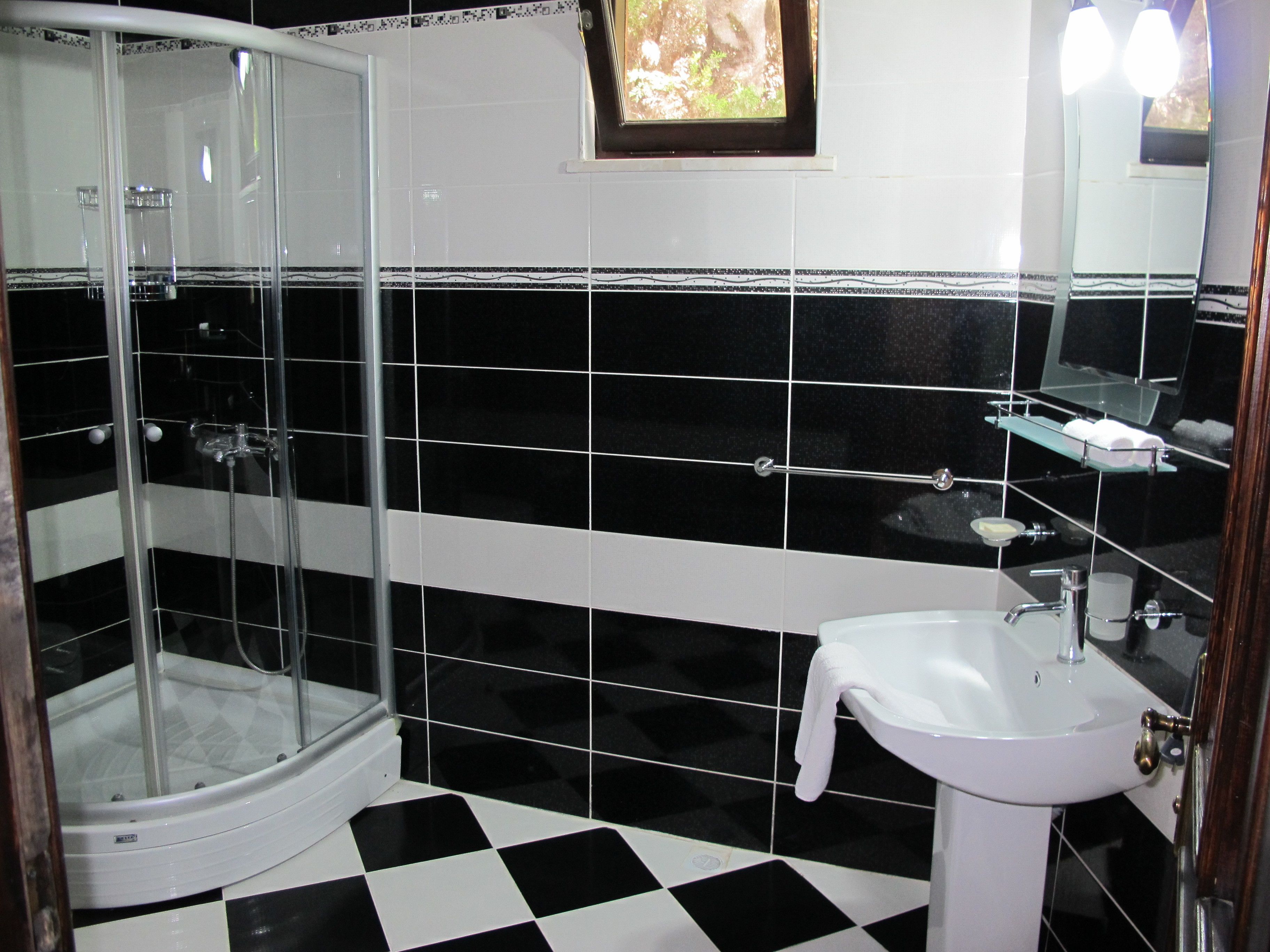 hair dryer, slippers, bidet, towels