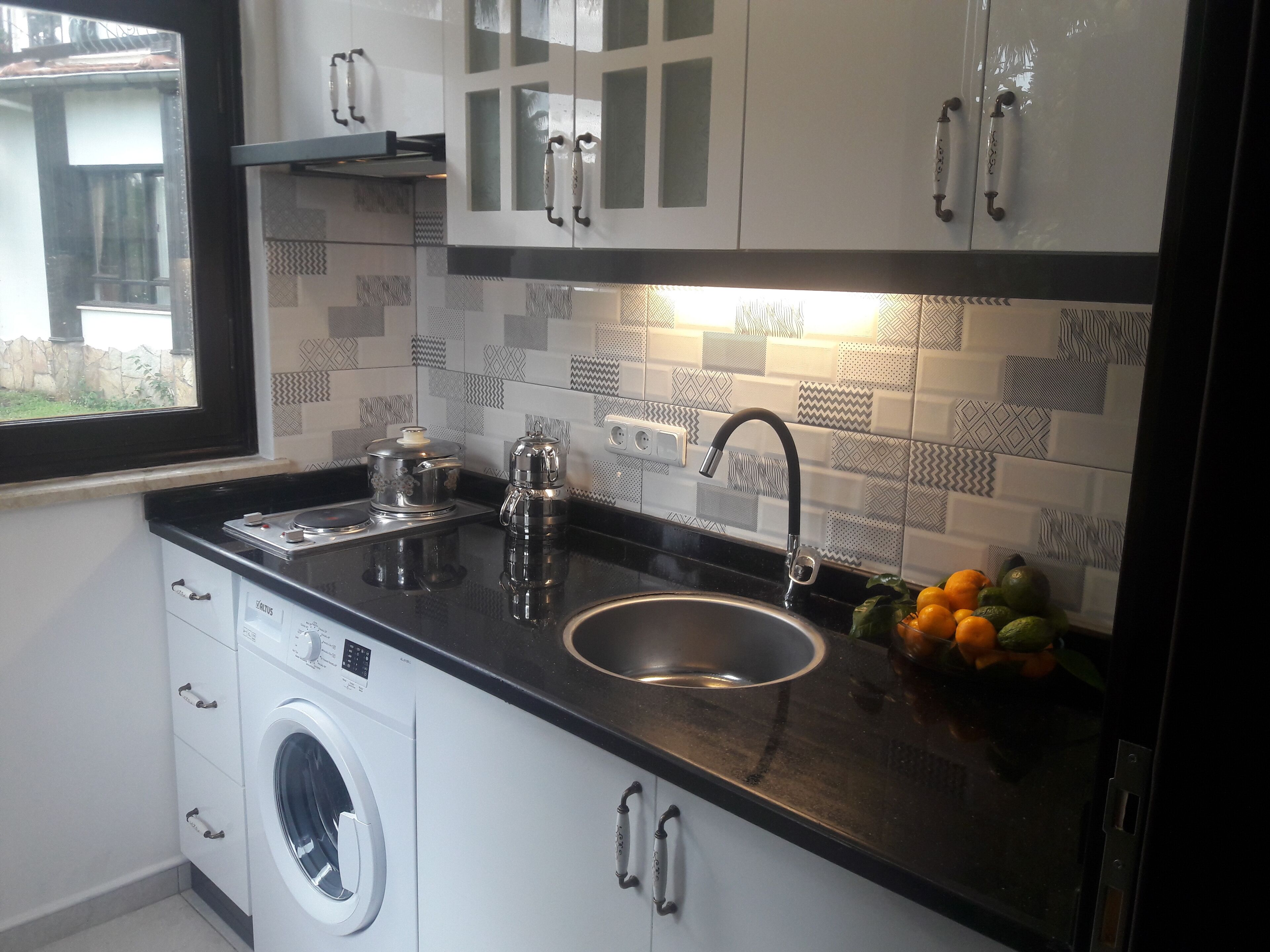 family room, 2 bedrooms, terrace | private kitchen | fridge, coffee/tea maker, electric kettle