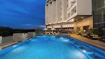 Outdoor pool, open 7:00 AM to 8:00 PM, sun loungers