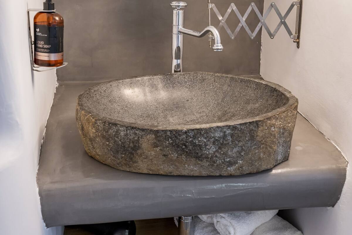 windmill deluxe suite with sharing pool | bathroom | hair dryer, towels, soap, shampoo