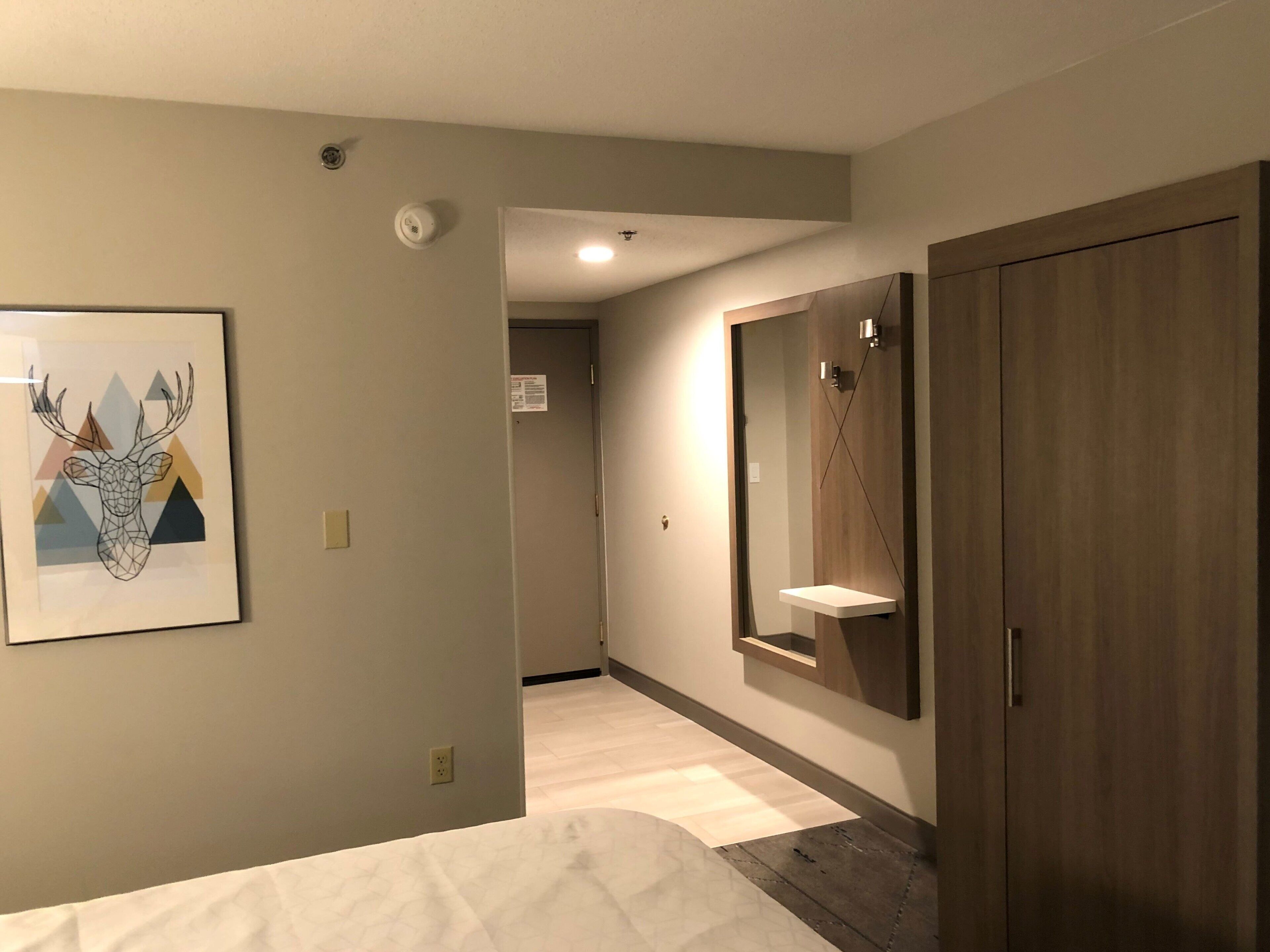 desk, laptop workspace, blackout curtains, iron/ironing board