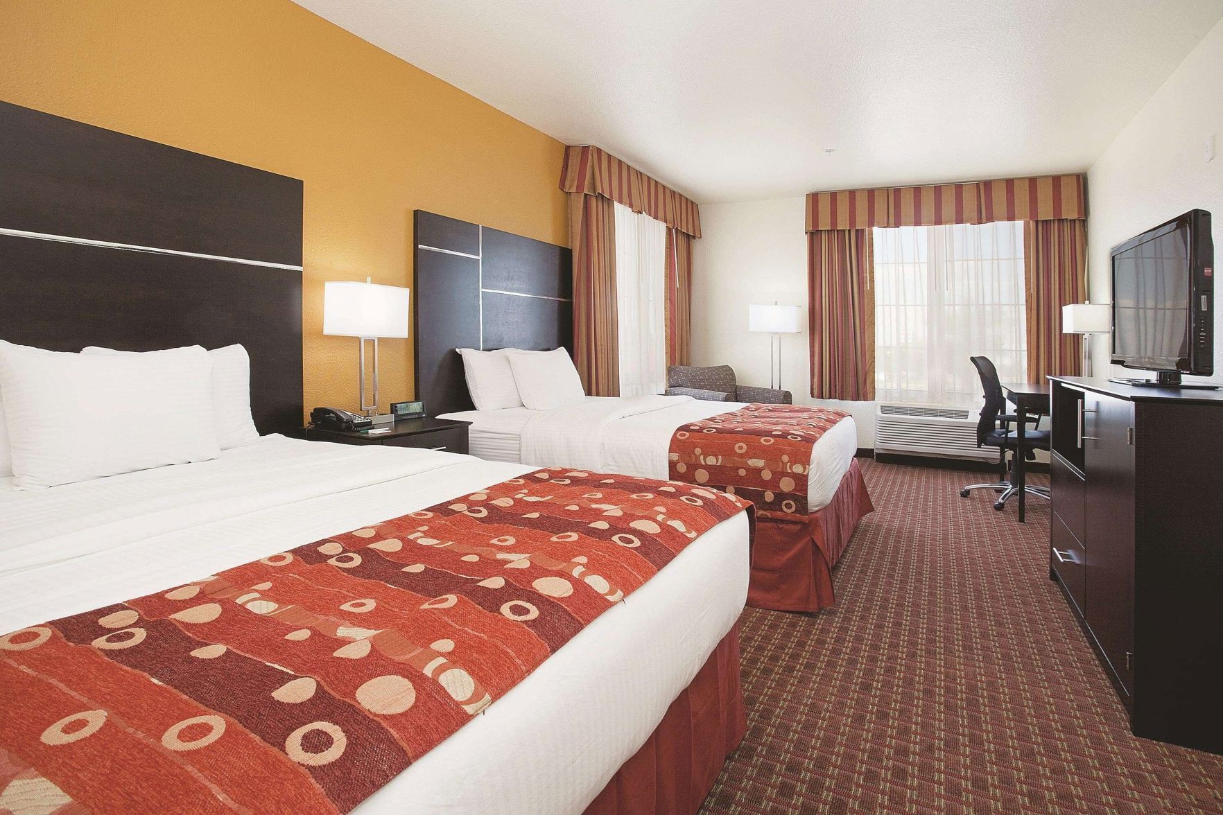 Premium bedding, down duvets, pillow-top beds, in-room safe