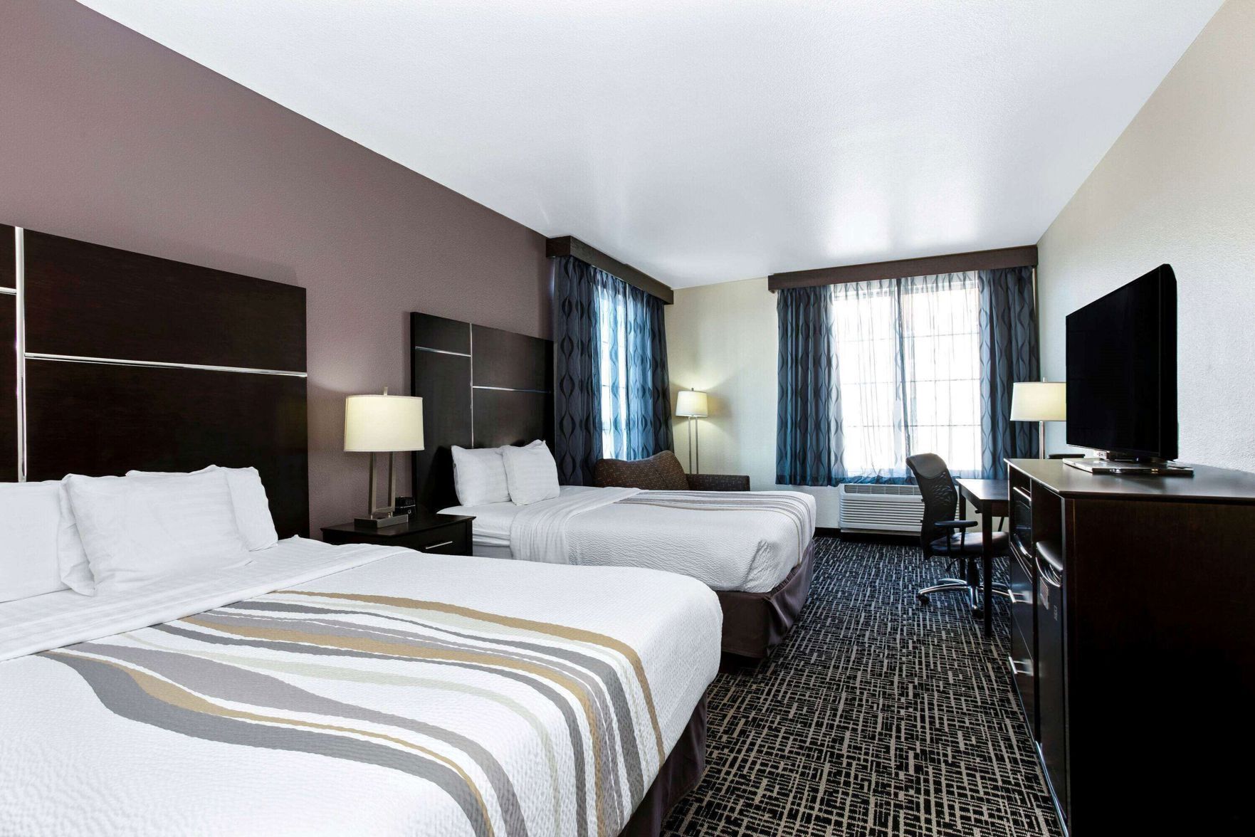 Premium bedding, down duvets, pillow-top beds, in-room safe