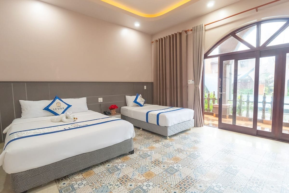 Premium Triple Room, Pool View | Minibar, in-room safe, desk, soundproofing