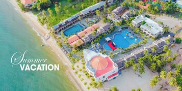 Private beach, white sand, sun loungers, beach umbrellas