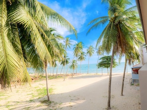 Private beach, white sand, sun loungers, beach umbrellas