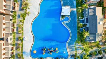Outdoor pool, open 6:00 AM to 10:00 PM, pool loungers