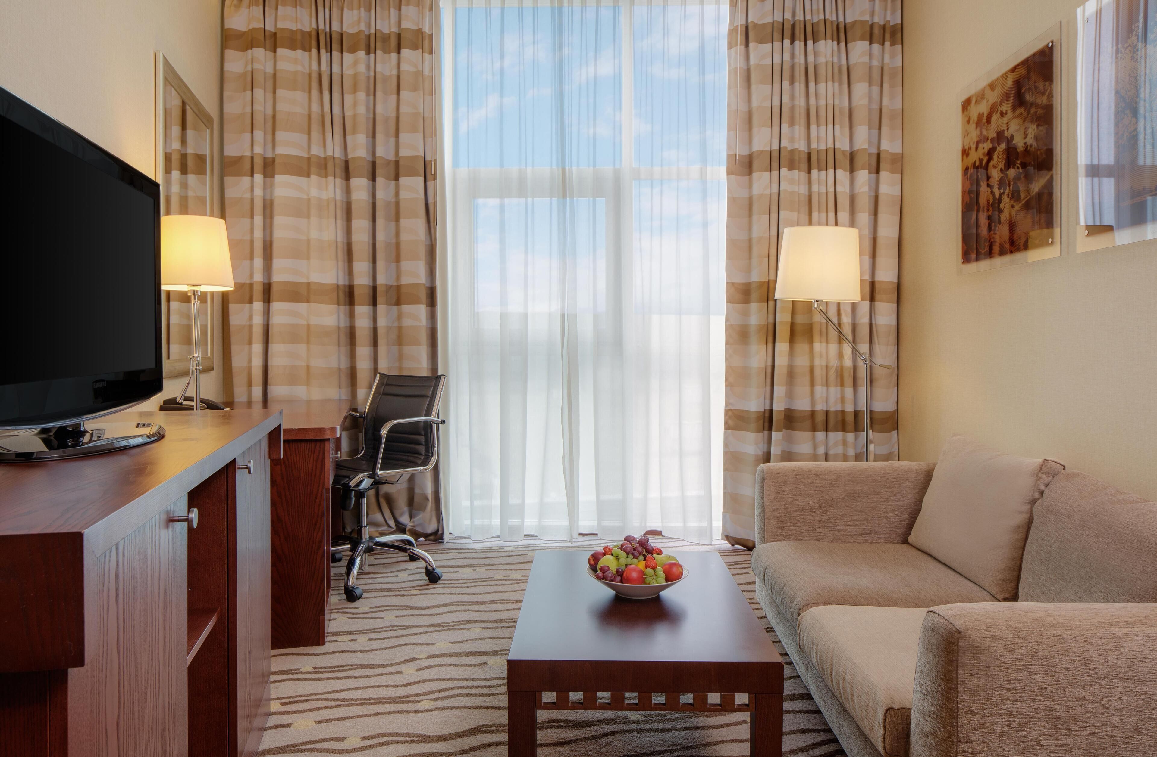 Suite, 1 Bedroom | Living area | LCD TV, MP3 dock