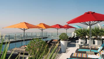 Outdoor pool, pool umbrellas, pool loungers