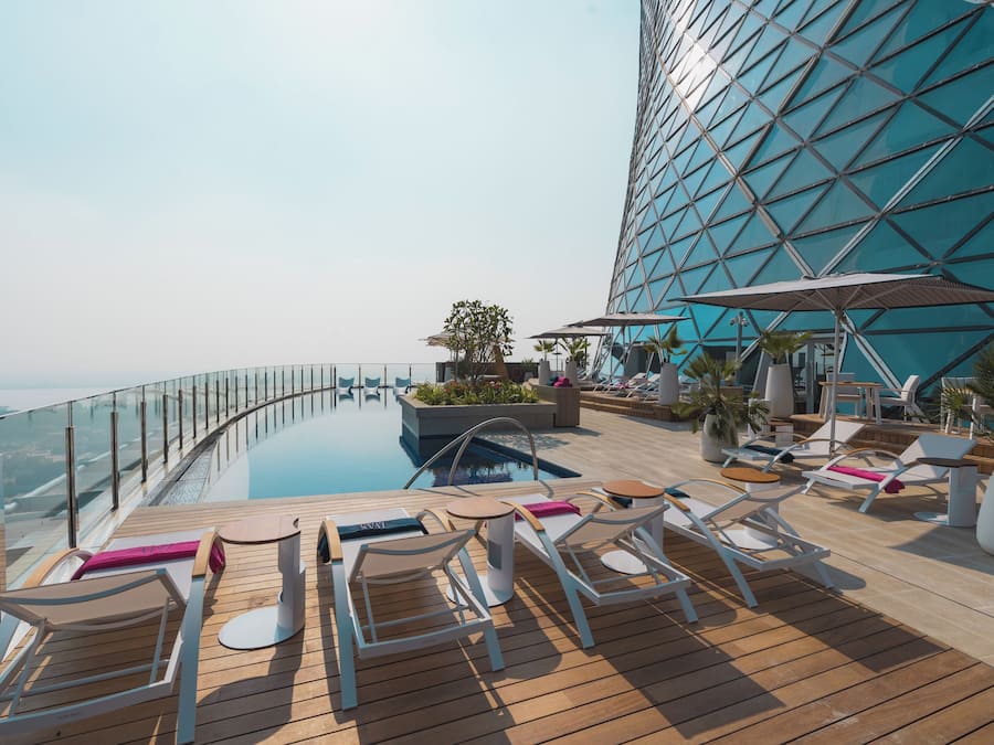 Outdoor pool, pool umbrellas, pool loungers