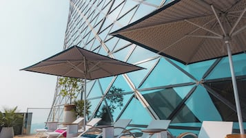 Outdoor pool, pool umbrellas, pool loungers