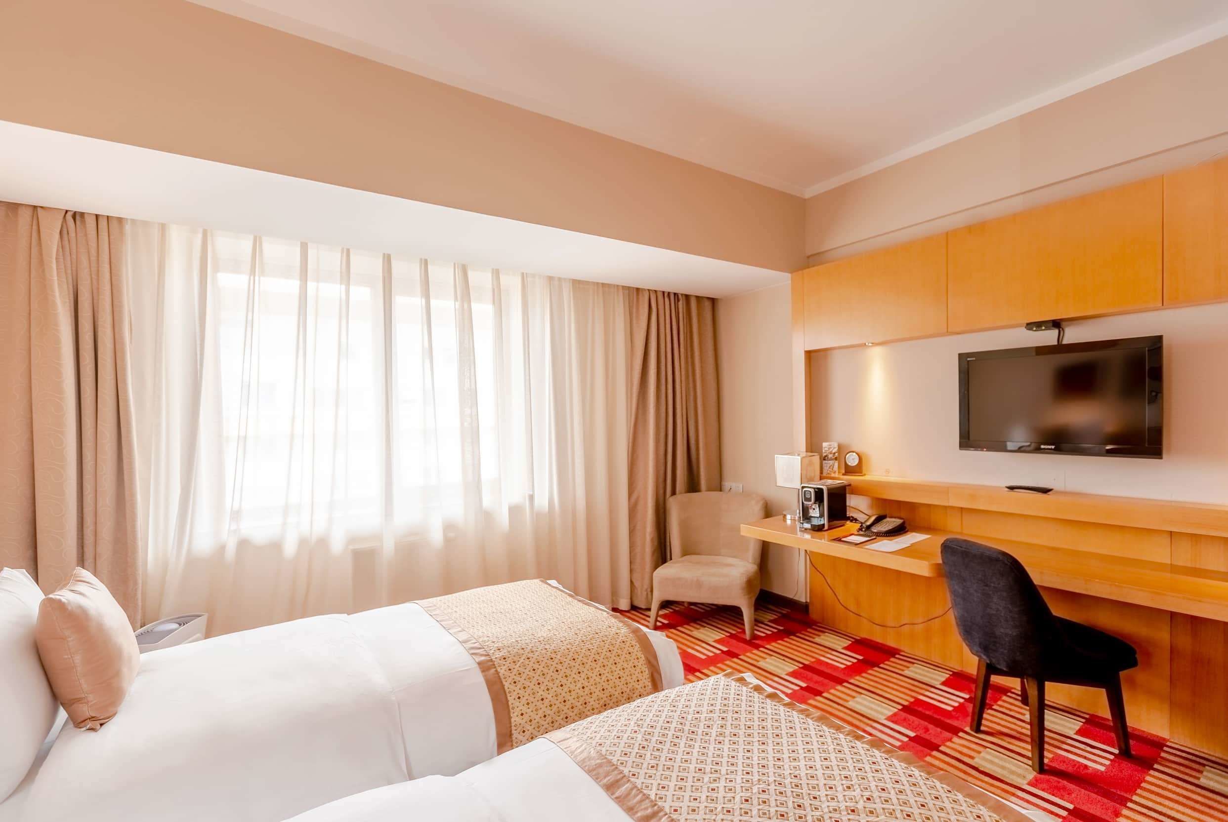 executive twin room, 2 single beds | hypo-allergenic bedding, minibar, in-room safe, individually decorated