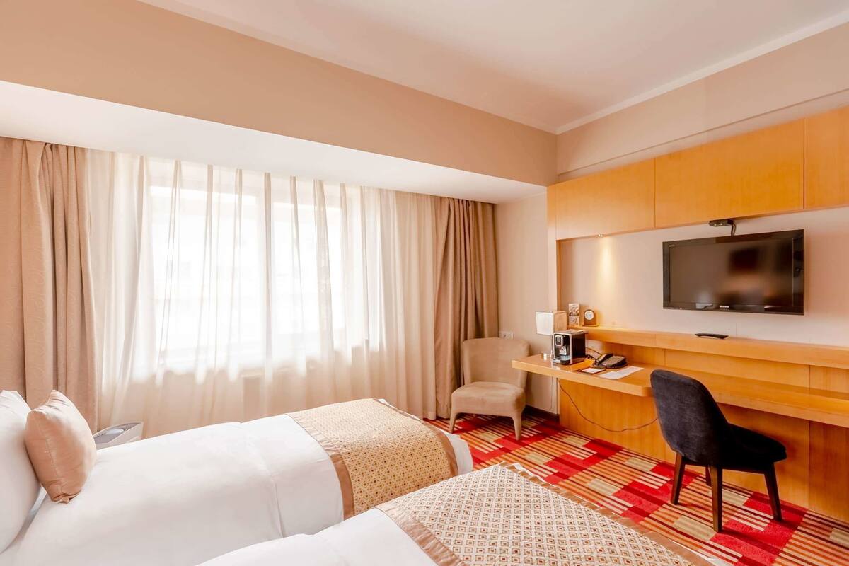 executive twin room, 2 single beds | hypo-allergenic bedding, minibar, in-room safe, individually decorated