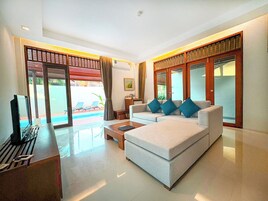 Pool Suite Villa | Living area | 32-inch LCD TV with satellite channels, TV