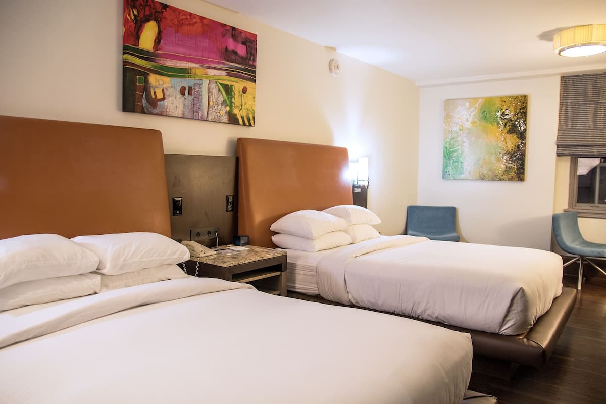 Hypo-allergenic bedding, down duvets, in-room safe