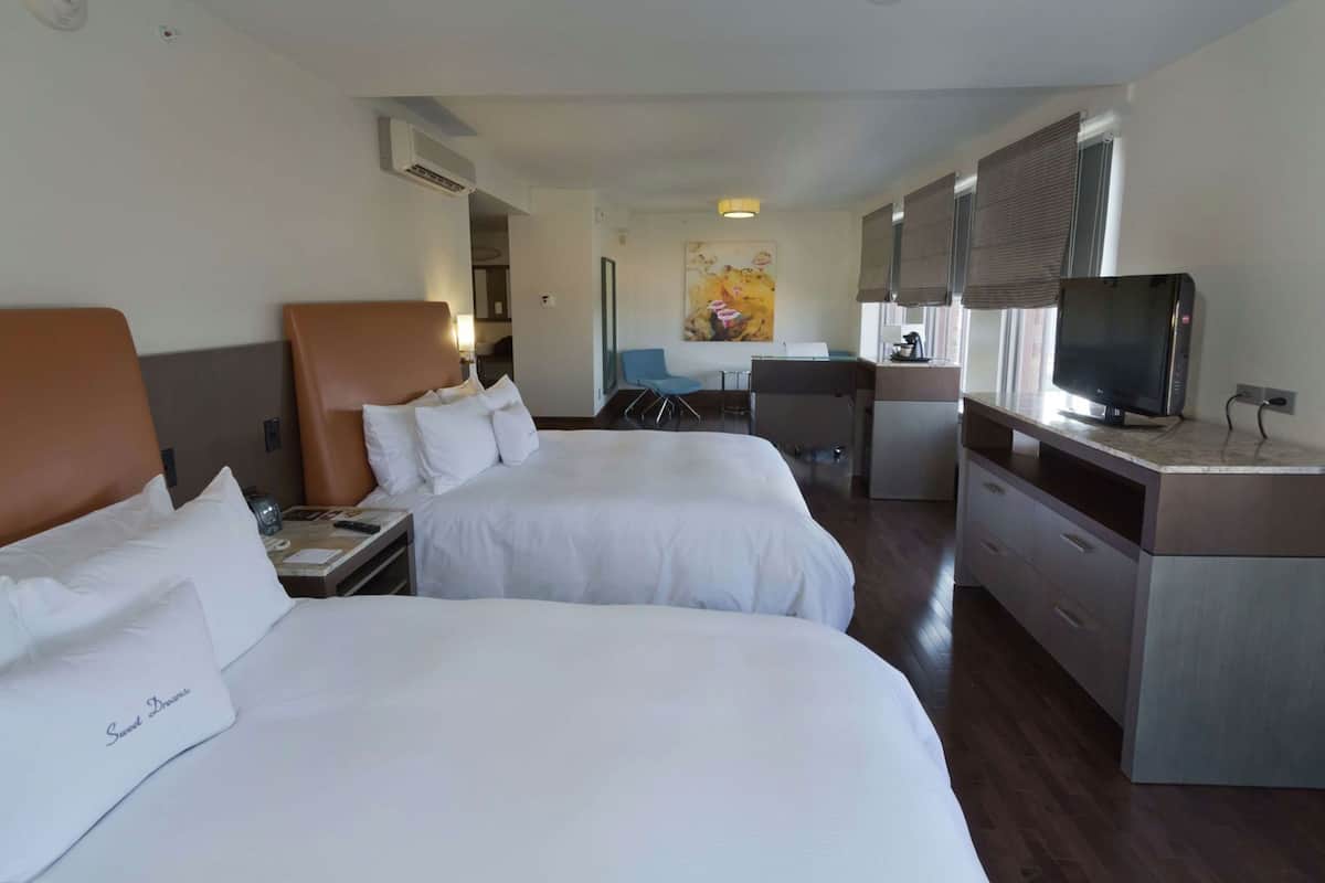 Hypo-allergenic bedding, down duvets, in-room safe
